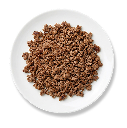 Cooked ground meat served on a white plate
