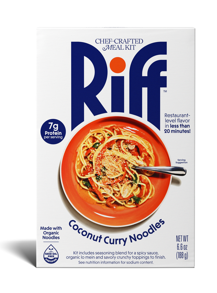 A box of Riff Coconut Curry Noodles chef-crafted meal kit, featuring a white box with navy branding and a photo of the prepared noodle dish on an orange plate on the front.