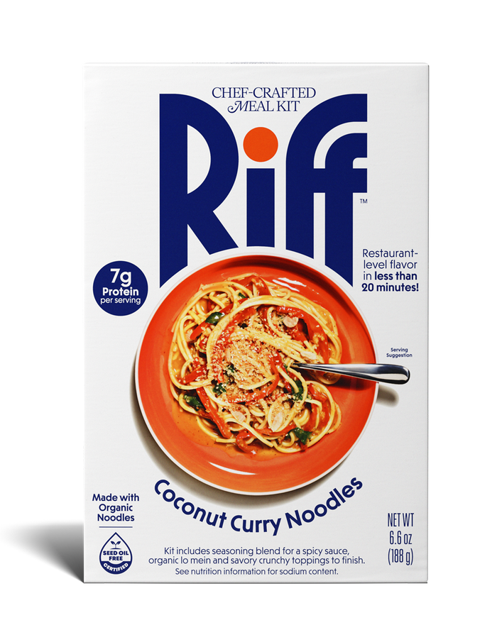 Front of a Riff Coconut Curry Noodles chef-crafted meal kit box, showing an orange bowl of coconut curry noodles with a spoon.