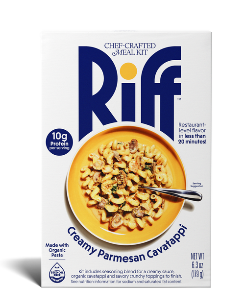 Front of a Riff Creamy Parmesan Cavatappi chef-crafted meal kit box shown straight-on, featuring a yellow bowl of creamy cavatappi pasta with mushrooms and herbs and a spoon resting in the dish.