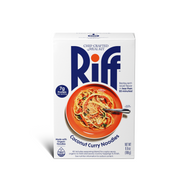 Front of a Riff Coconut Curry Noodles chef-crafted meal kit box, featuring an orange plate of noodles tossed in sauce with a fork.