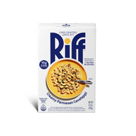 A box of Riff Creamy Parmesan Cavatappi chef-crafted meal kit, featuring a white box with blue branding and a photo of the prepared pasta dish on the front.